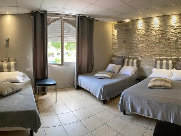 Hôtel Le Derby : photo 2 de la chambre chambre quadruple