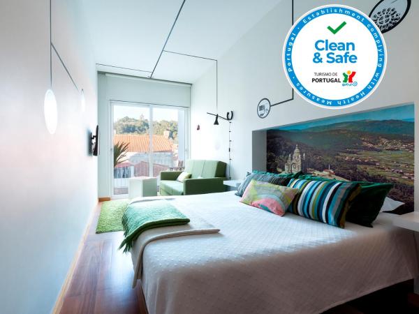 Pensao O Laranjeira : photo 2 de la chambre chambre double supérieure avec terrasse