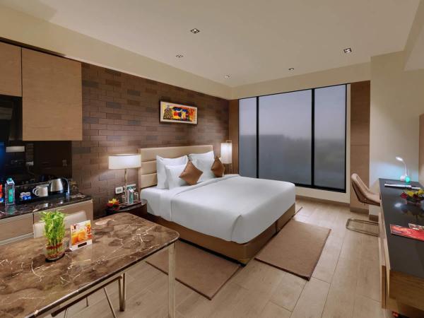 Wyndham Ahmedabad Shela : photo 1 de la chambre deluxe room, 1 king or 1 twin bed, city or garden view, non-smoking