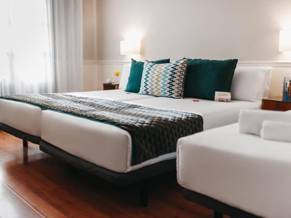 Oriente Atiram : photo 1 de la chambre chambre triple