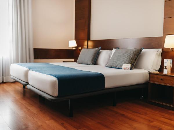 Oriente Atiram : photo 2 de la chambre chambre lits jumeaux