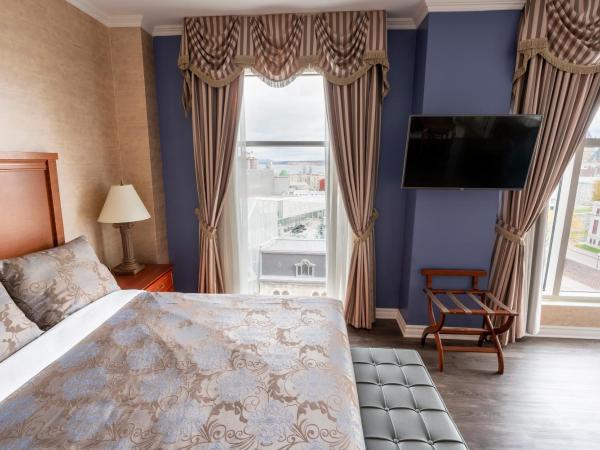 Hôtel Palace Royal : photo 4 de la chambre suite avec 1 lit king-size - vue panoramique sur ville