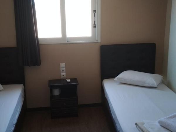 Pella Inn Hostel : photo 1 de la chambre chambre lits jumeaux Économique