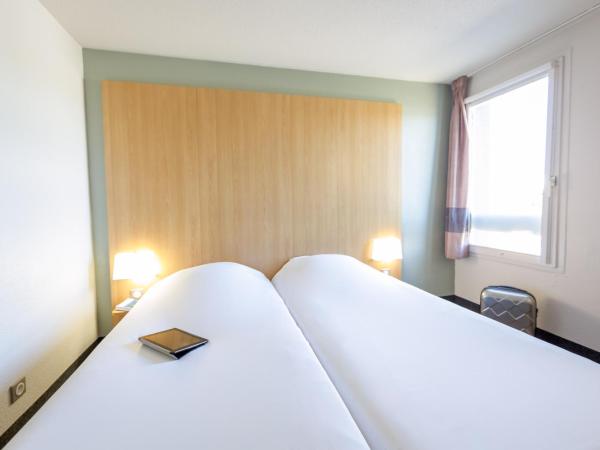 B&B HOTEL PERPIGNAN Nord Aéroport : photo 5 de la chambre chambre lits jumeaux