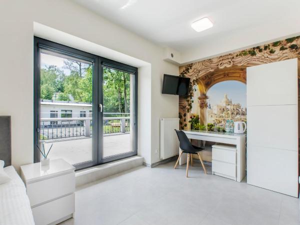 Bema Rooms : photo 3 de la chambre appartement avec terrasse