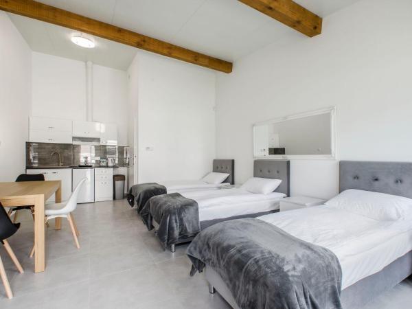 Bema Rooms : photo 9 de la chambre chambre triple basique