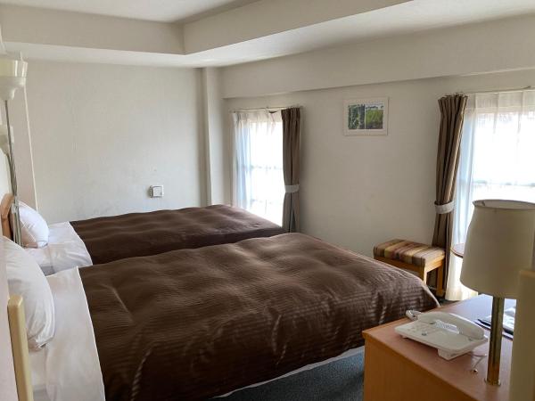 Sakura Hotel Hatagaya : photo 2 de la chambre chambre quadruple