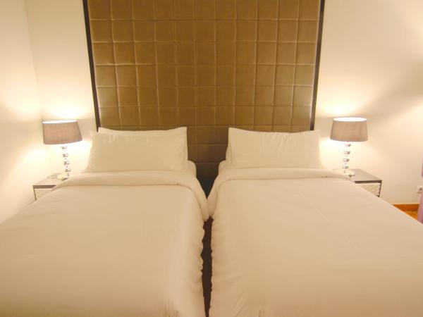 Hotel Diradja : photo 2 de la chambre chambre deluxe double ou lits jumeaux