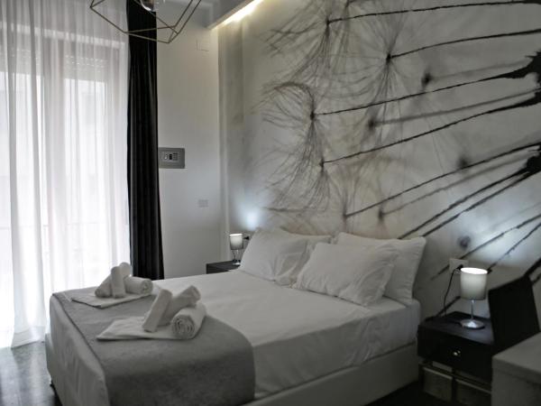 Le Corti del Re : photo 1 de la chambre chambre double ou lits jumeaux deluxe avec balcon