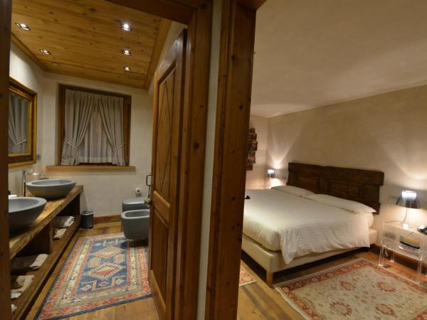 Le Reve Charmant : photo 2 de la chambre chambre deluxe double ou lits jumeaux