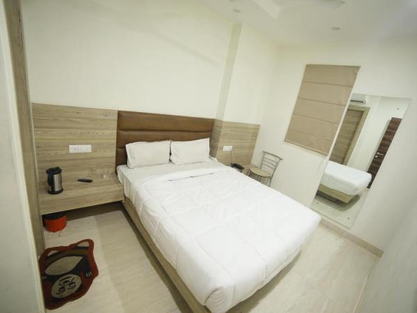 Hotel Shri Ram Residency : photo 5 de la chambre chambre double deluxe (2 adultes + 1 enfant)