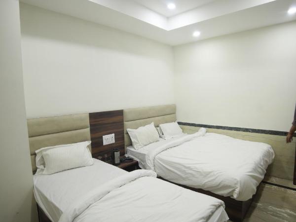 Hotel Shri Ram Residency : photo 2 de la chambre chambre double deluxe (2 adultes + 1 enfant)