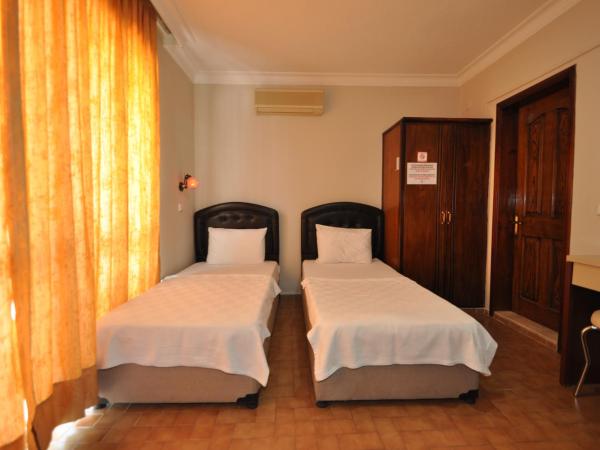 Defne & Zevkim Hotel : photo 8 de la chambre chambre familiale