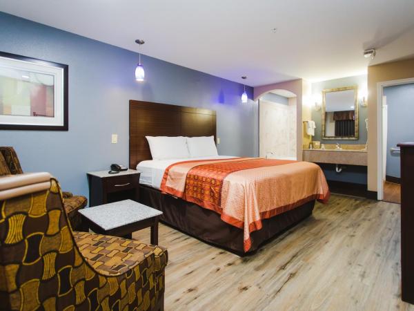 Home Place Inn : photo 3 de la chambre chambre lit king-size avec baignoire spa - non-fumeurs