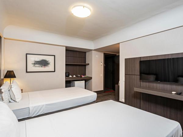 Slaviero Curitiba Centro : photo 3 de la chambre chambre familiale supérieure