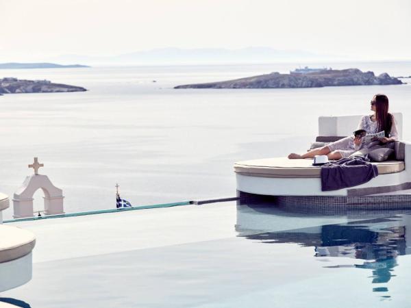 Absolute Mykonos Suites & More : photo 1 de la chambre moulin à vent traditionnel jacuzzi extérieur