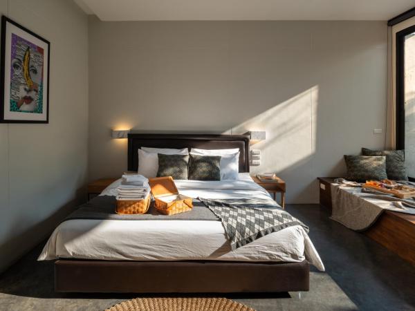 Cherlock hotel : photo 7 de la chambre chambre lit king-size - vue sur piscine