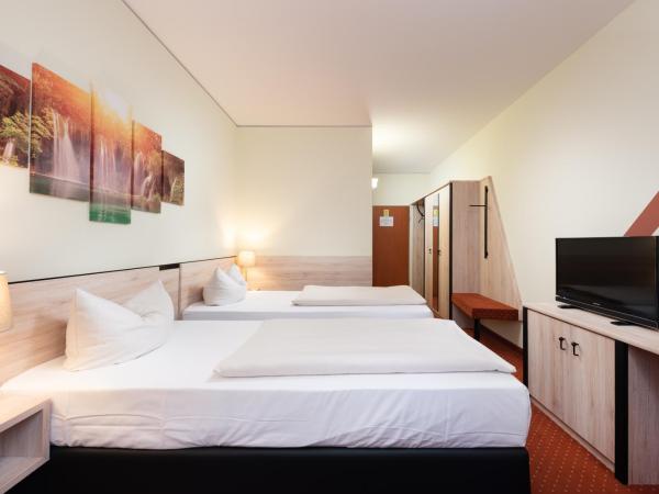 NOVINA HOTEL Südwestpark : photo 3 de la chambre chambre lits jumeaux confort