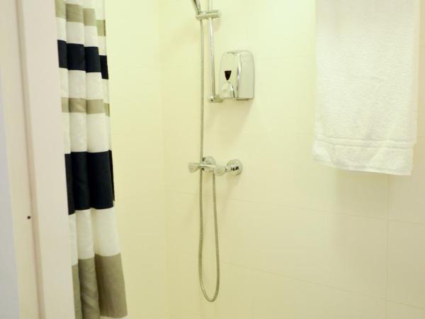 Family Hotel Kooyk : photo 6 de la chambre chambre double ou lits jumeaux supérieure avec salle de bains privative - vue sur jardin