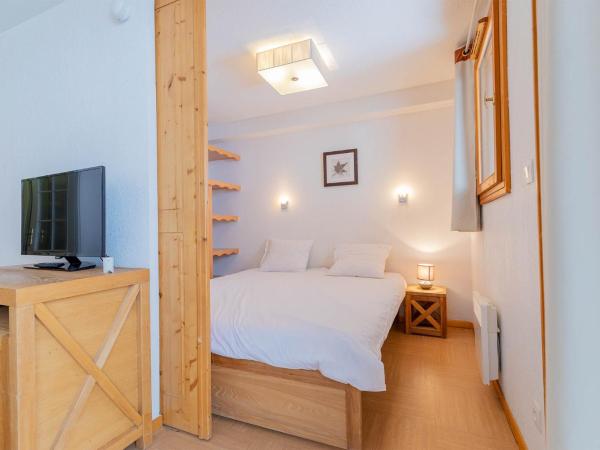 Madame Vacances Résidence Le Parc Des Airelles : photo 2 de la chambre appartement 2 chambres - vue sur pistes (7 adultes) - bbz