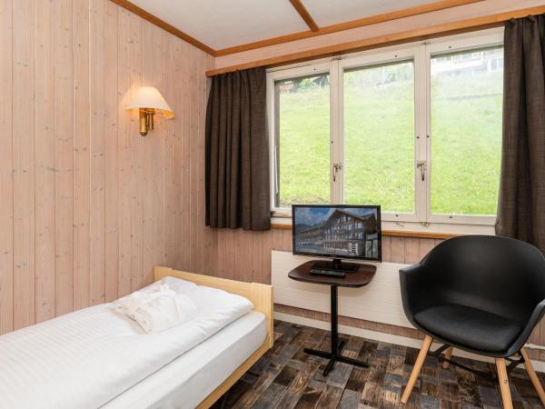 Basic Rooms Jungfrau Lodge : photo 1 de la chambre chambre simple basique plus avec douche et toilettes communes