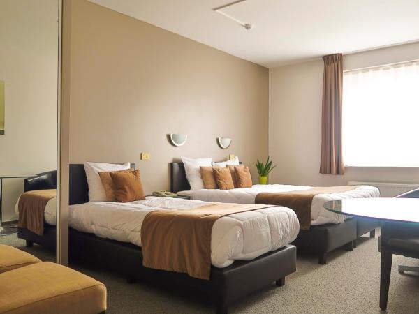 Hotel Adoma : photo 9 de la chambre chambre triple