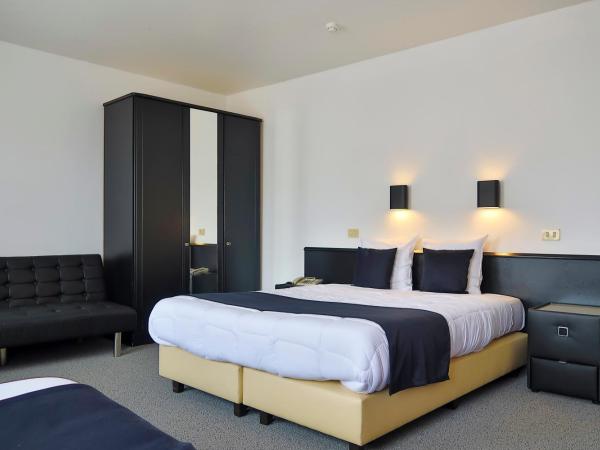 Hotel Adoma : photo 5 de la chambre chambre triple