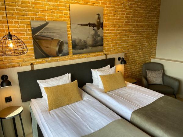 Skyline Airport Hotel : photo 3 de la chambre chambre lits jumeaux