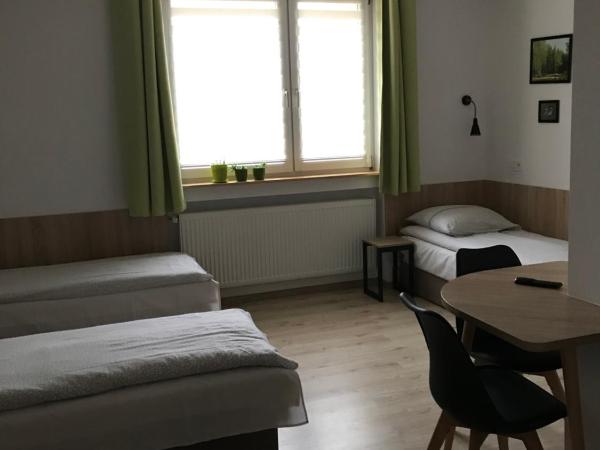 Kathia Pokoje Gościnne : photo 6 de la chambre chambre triple avec salle de bains privative