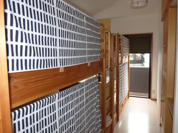Guesthouse Hyakumanben Cross : photo 4 de la chambre lit simple dans dortoir pour femmes