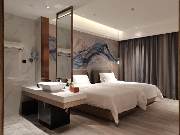 Paco Hotel Jinfeng Metro Guangzhou - Free Shuttle Bus For Canton Fair : photo 3 de la chambre chambre lits jumeaux supérieure