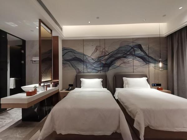 Paco Hotel Jinfeng Metro Guangzhou - Free Shuttle Bus For Canton Fair : photo 7 de la chambre chambre lits jumeaux supérieure