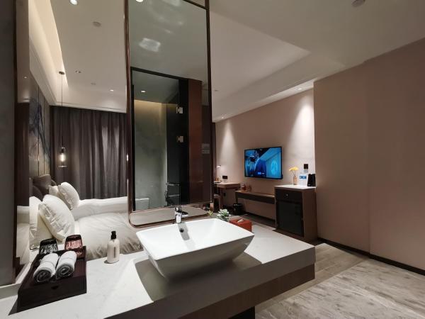 Paco Hotel Jinfeng Metro Guangzhou - Free Shuttle Bus For Canton Fair : photo 8 de la chambre chambre lits jumeaux supérieure