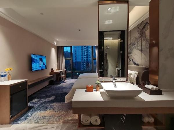 Paco Hotel Jinfeng Metro Guangzhou - Free Shuttle Bus For Canton Fair : photo 3 de la chambre chambre lits jumeaux deluxe