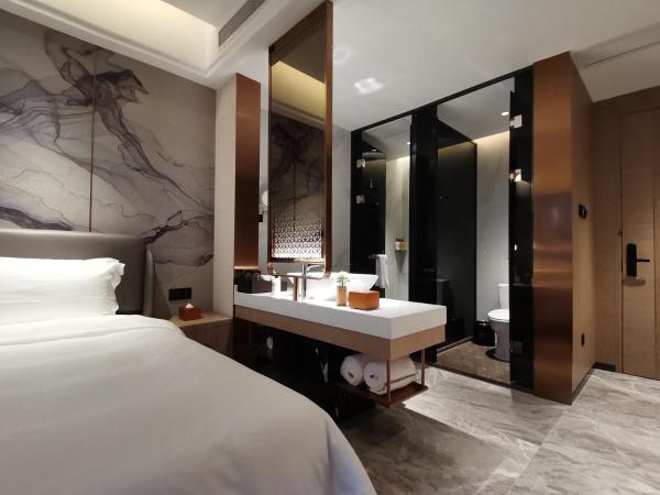 Paco Hotel Jinfeng Metro Guangzhou - Free Shuttle Bus For Canton Fair : photo 6 de la chambre chambre lits jumeaux deluxe