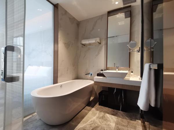 Paco Hotel Jinfeng Metro Guangzhou - Free Shuttle Bus For Canton Fair : photo 5 de la chambre chambre simple avec baignoire