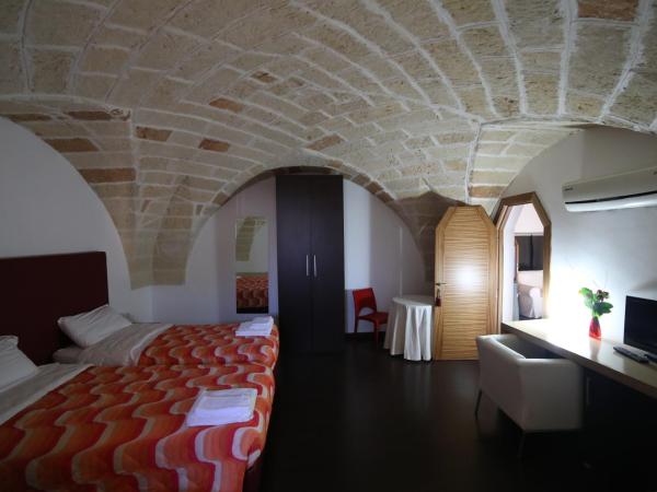 Bed & Breakfast Idomeneo 63 : photo 7 de la chambre chambre quadruple