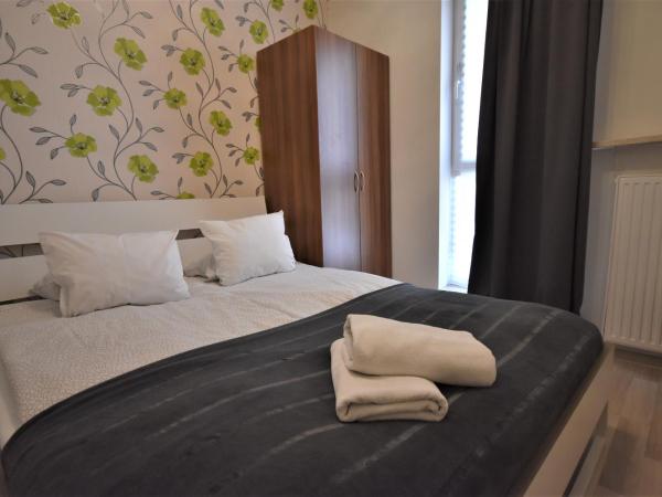 NotaBene Wola Apartment : photo 2 de la chambre appartement 2 chambres