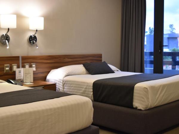 Estanza Hotel & Suites : photo 8 de la chambre chambre lits jumeaux