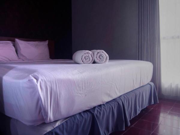 Ndalem Mantrigawen : photo 5 de la chambre chambre double standard