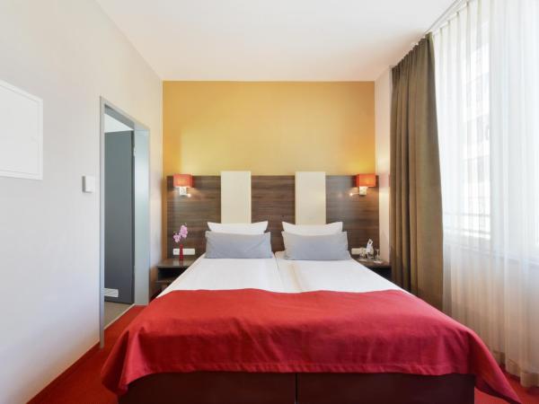 KOOS Hotel&Apartments - City Aparthotel : photo 7 de la chambre chambre double ou lits jumeaux