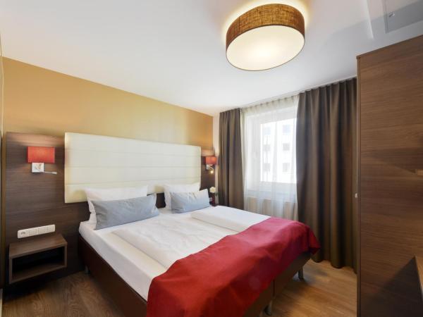 KOOS Hotel&Apartments - City Aparthotel : photo 4 de la chambre appartement 4 pièces