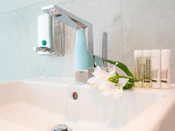 KOOS Hotel&Apartments - City Aparthotel : photo 8 de la chambre suite avec toit-terrasse privé