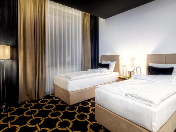 Jess Hotel Krolewski Gdansk Old Town : photo 4 de la chambre chambre lits jumeaux deluxe