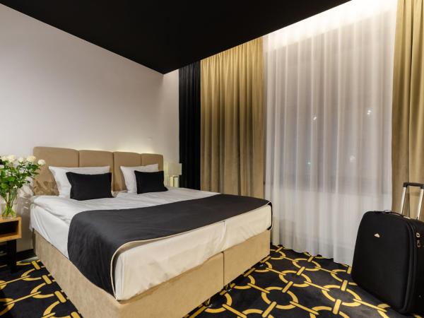 Jess Hotel Krolewski Gdansk Old Town : photo 3 de la chambre chambre lit king-size deluxe