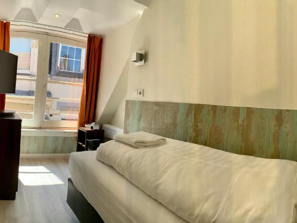 Hotel Damrak Inn : photo 1 de la chambre chambre simple avec salle de bains privative