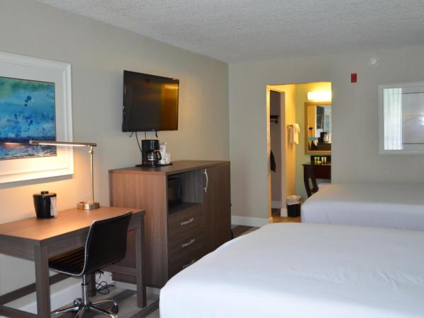 Opal Hotel & Suites : photo 5 de la chambre hébergement lit queen-size rénové - vue sur piscine