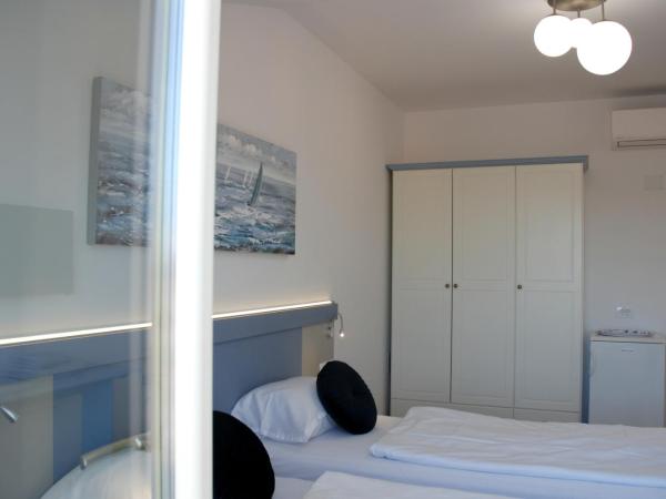 B&B Sea Joy Rovinj : photo 3 de la chambre chambre lits jumeaux deluxe - vue sur mer