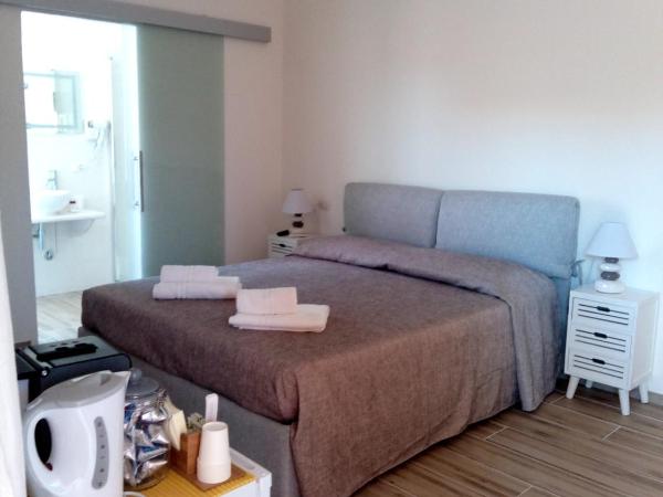 Flamingo Guest House- Rooms : photo 3 de la chambre chambre familiale avec salle de bains privative
