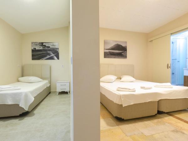 Hayalbaz : photo 3 de la chambre chambre triple - vue sur mer